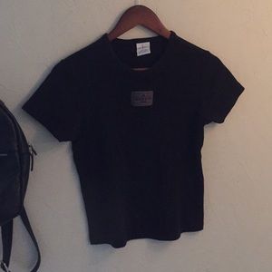 Black Calvin Klein mini tee with decal in center